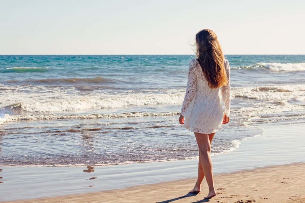 Image of Young Woman On Beach